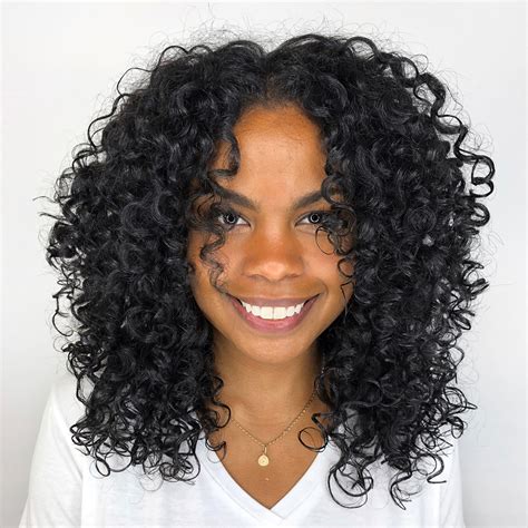 curly hair cuts for women|natural long curly hair from the back.